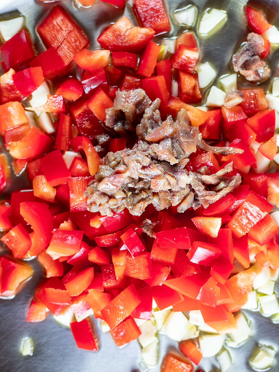 Add Olive Oil, Garlic, Pepper, & Anchovies to Skillet