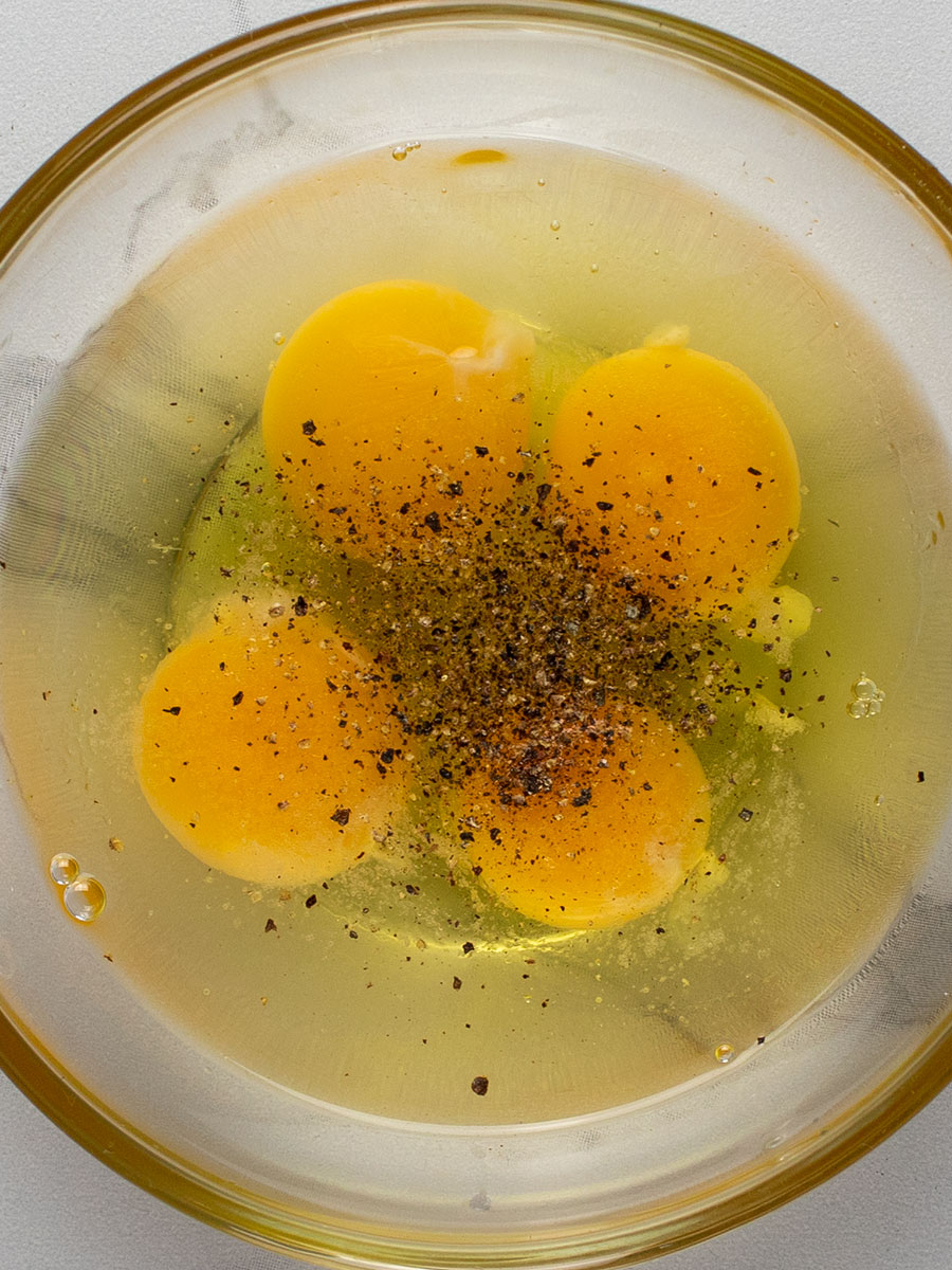 Eggs & Seasoning in Bowl